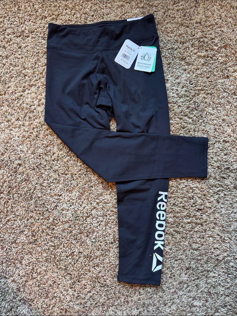 Reebok Black Leggings with White Reebok Side Logo